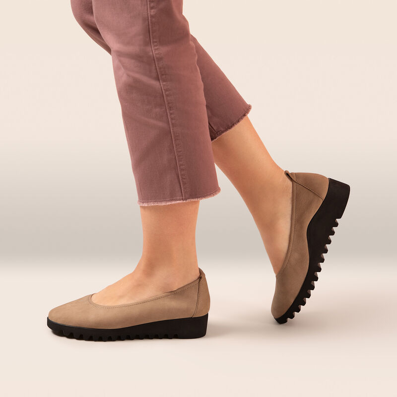 taupe ballet flat on foot